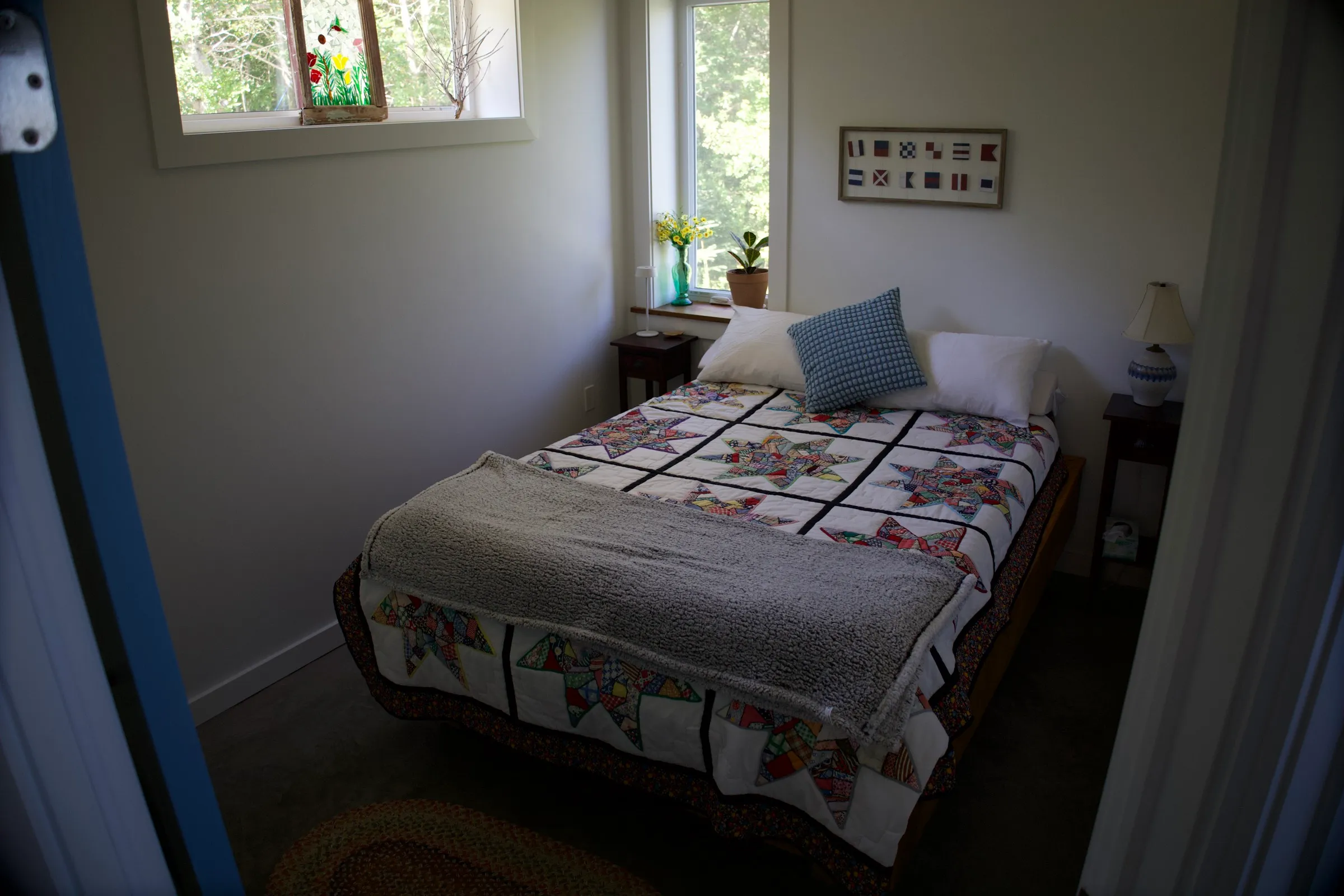 Second bedroom with a queen bed and crisp linens