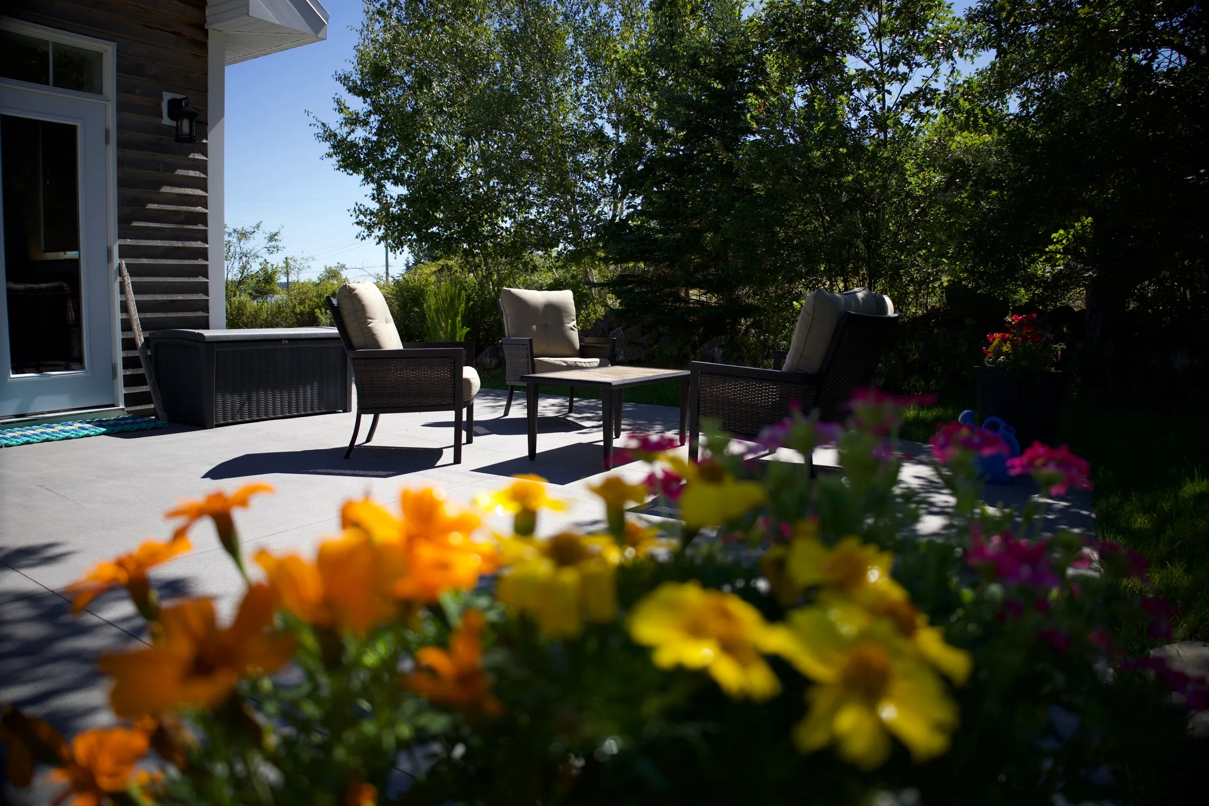 Indoor seating area with fresh flowers and natural light